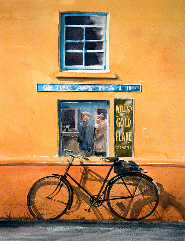bicycle against a yellow wall, ireland