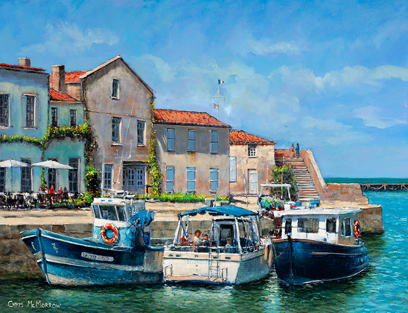 Three boats moored in a beautiful French harbour