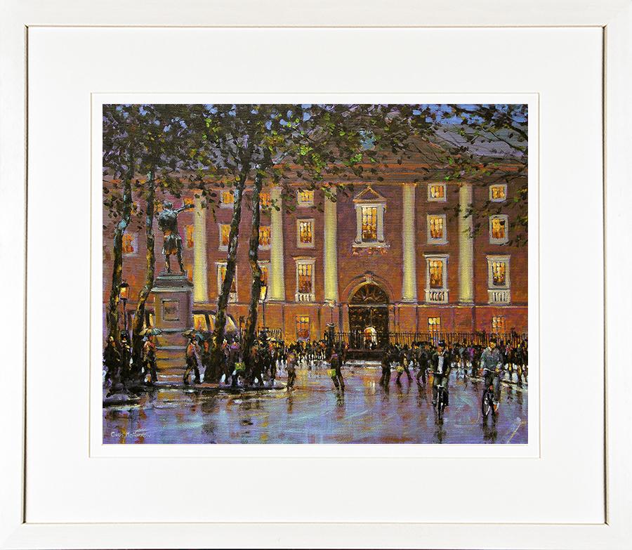 Framed print of the front of Trinity College on a rainy damp evening print
