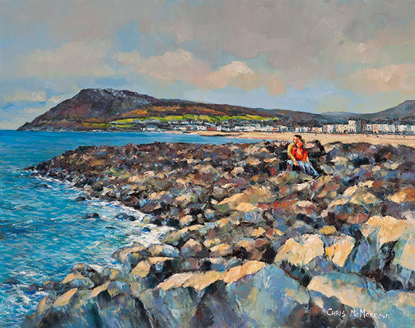 A painting of a couple sitting on the rocks looking out to sea