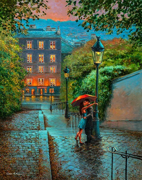 A couple of lovers embrace on the steps of Montmartre, Paris.