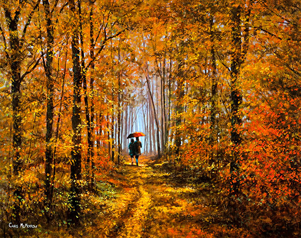 A couple taking a stroll in the woods, the reds and gold of autumn on display