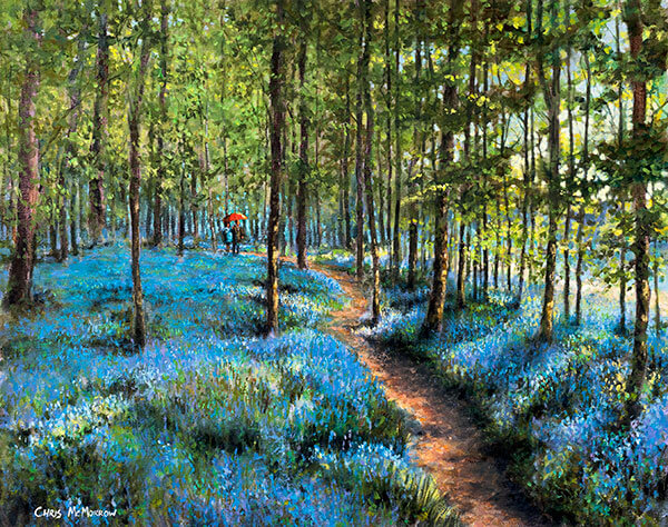 A couple take a romantic walk in a forest of bluebells