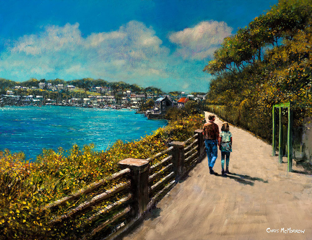 A couple walking along the Scilly Walk