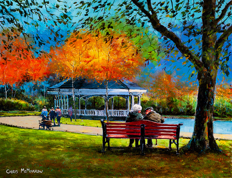 An old couple take time out together on a park bench in Stephens Green, Dublin